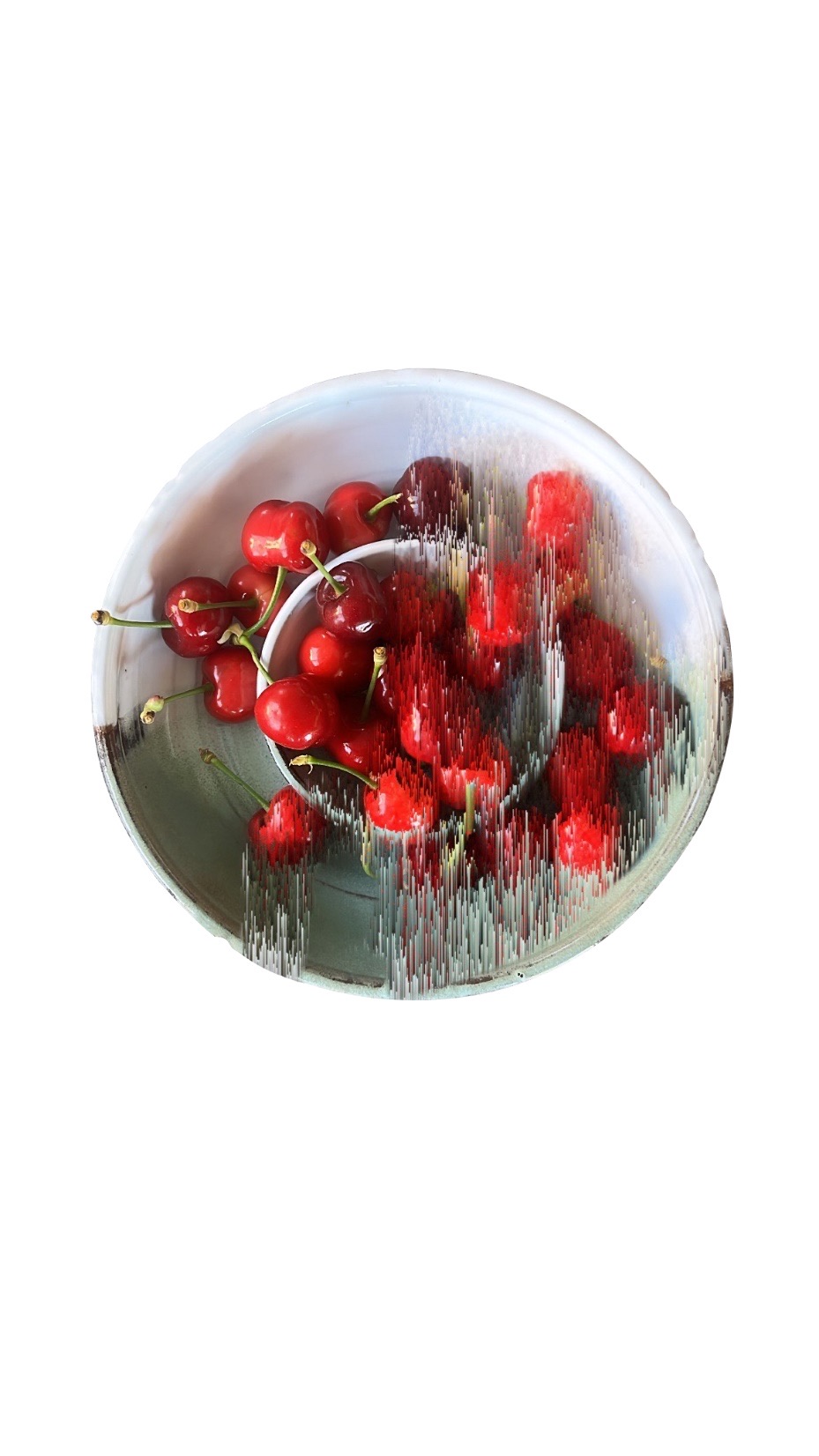 A bowl of cherries, partly smeared by digital distortion